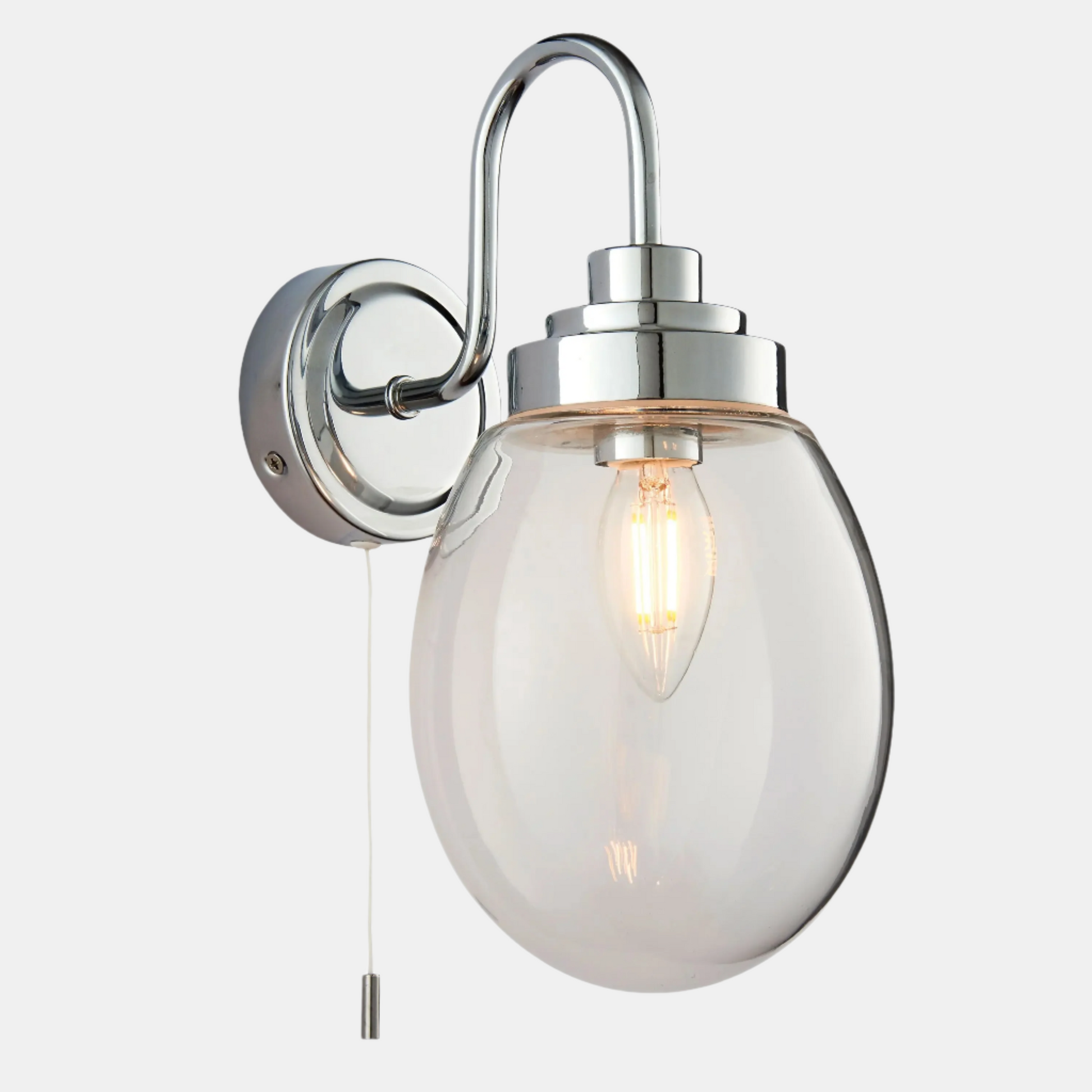 Wall-mounted light fixture with glass shade and chrome finish on a white background