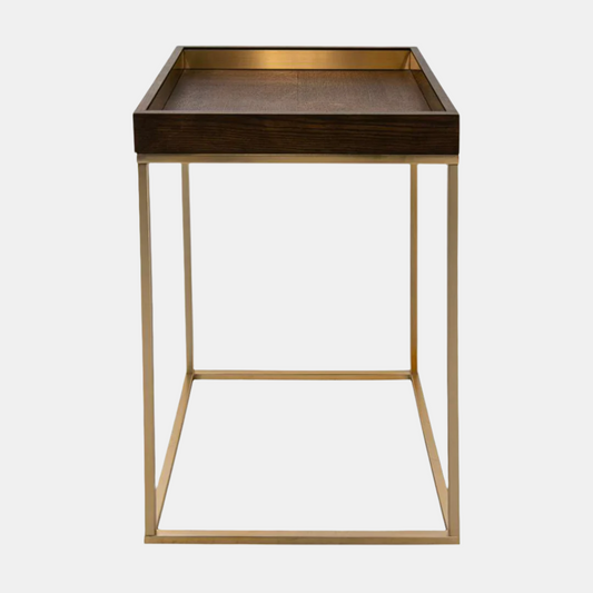 Small side table with a bronze tray top and gold metal frame on a white background