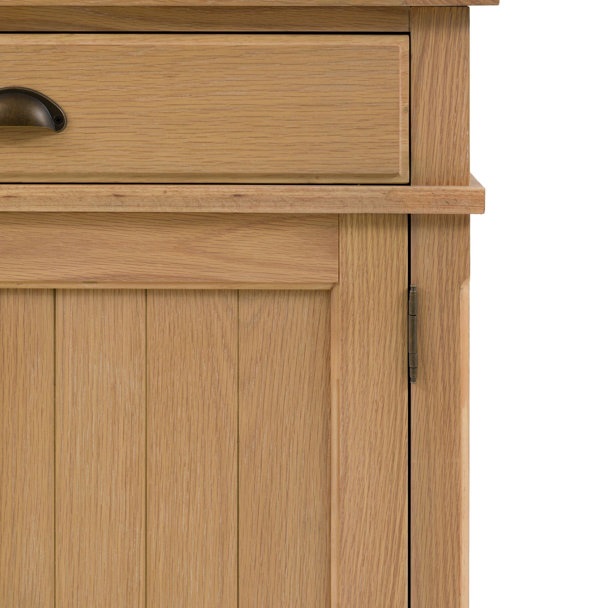 Close-up of a wooden cabinet with a visible hinge and handle.