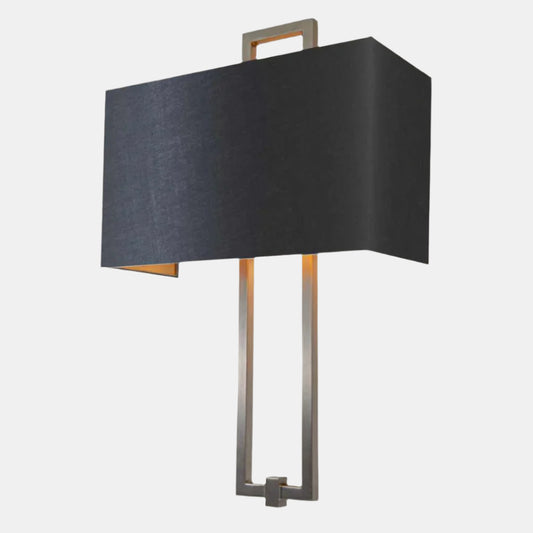 Wall-mounted lamp with black shade and metal frame on a light gray background